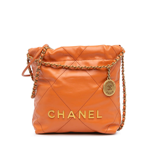 Second hand Chanel Chanel 22 Mini Leather Bucket Crossbody Orange - Tabita Bags