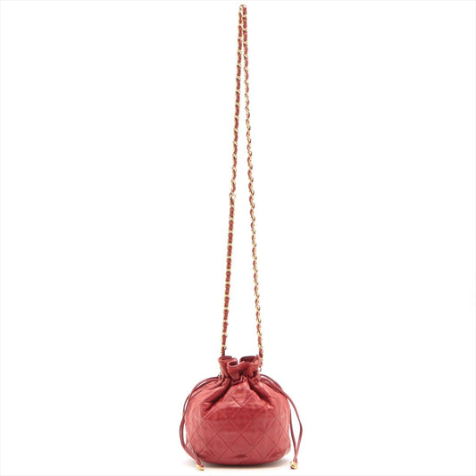 Second hand Chanel Mini Drawstring Bucket 1986-1988 Red Quilted Lambskin Gold - Tabita Bags