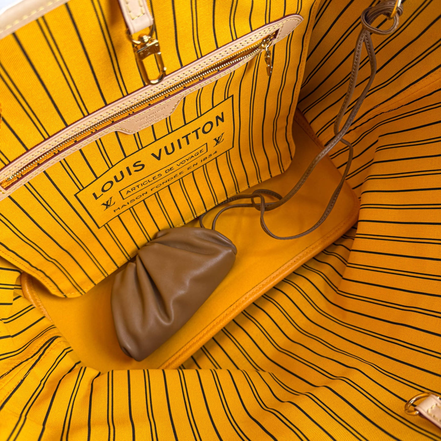 Borsa Extra Mini Pouch in pelle marrone