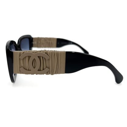 Lunettes de soleil bicolores en acétate carré et cuir de veau 