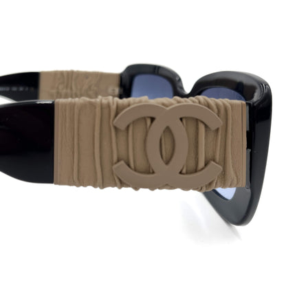 Lunettes de soleil bicolores en acétate carré et cuir de veau 