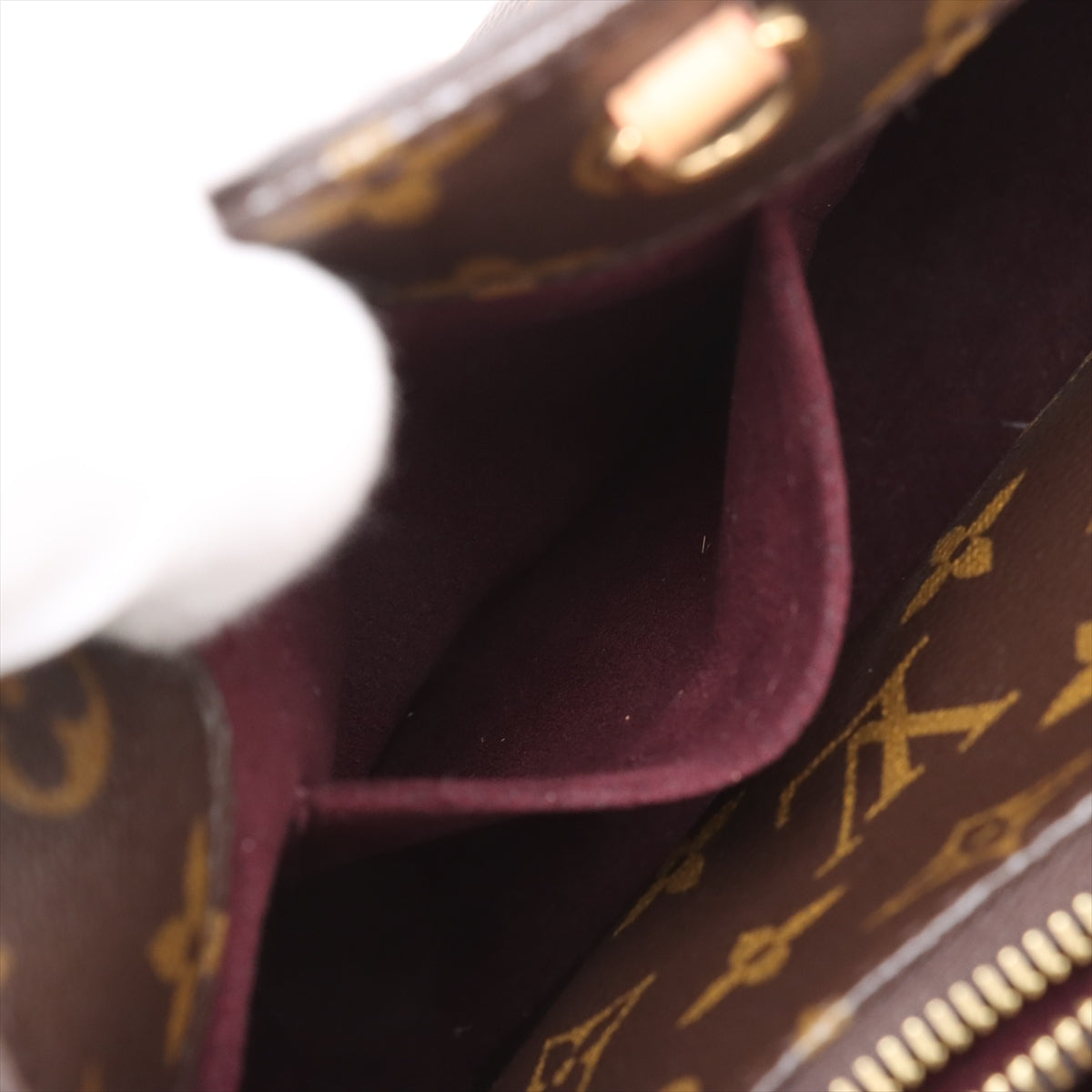 Bolsa Montaigne BB Monogram de lona com alça de mão 