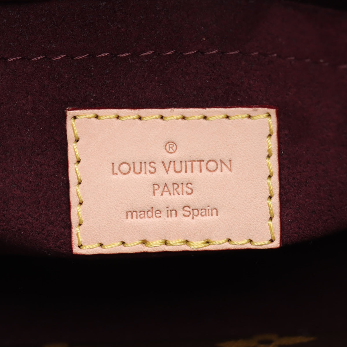 Bolsa Montaigne BB Monogram de lona com alça de mão 
