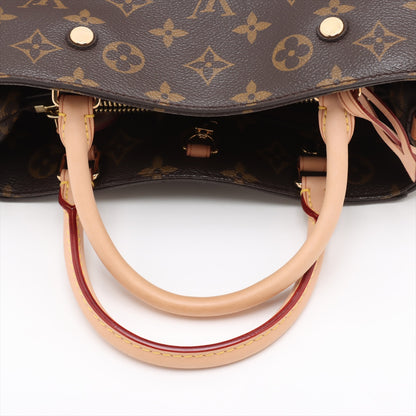 Bolsa Montaigne BB Monogram de lona com alça de mão 