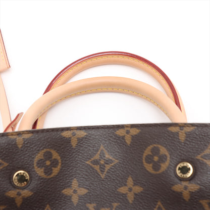 Bolsa Montaigne BB Monogram de lona com alça de mão 