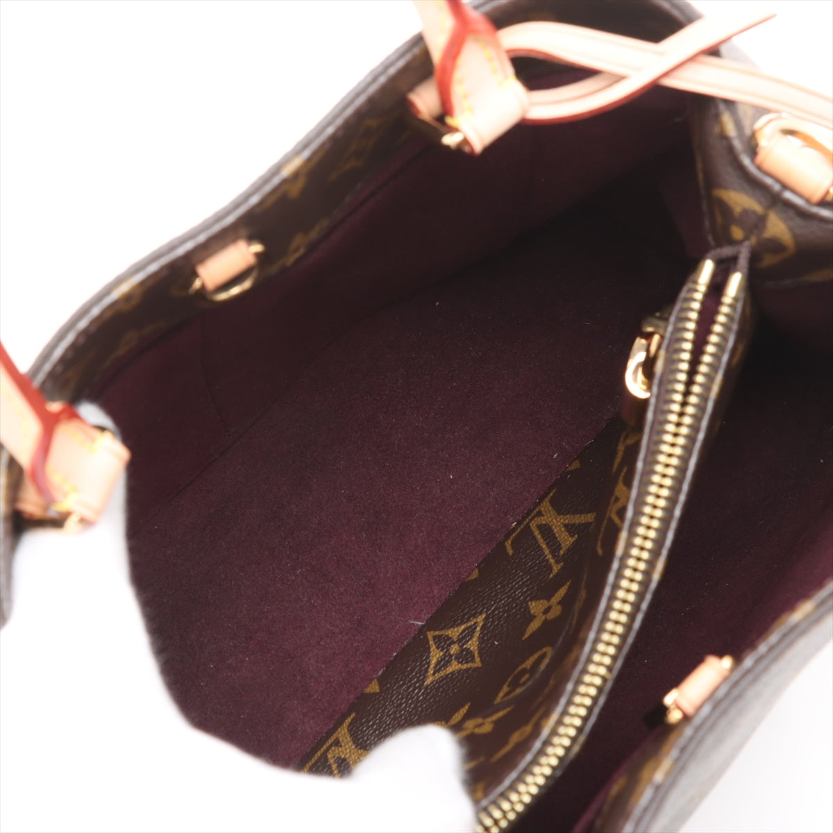 Bolsa Montaigne BB Monogram de lona com alça de mão 