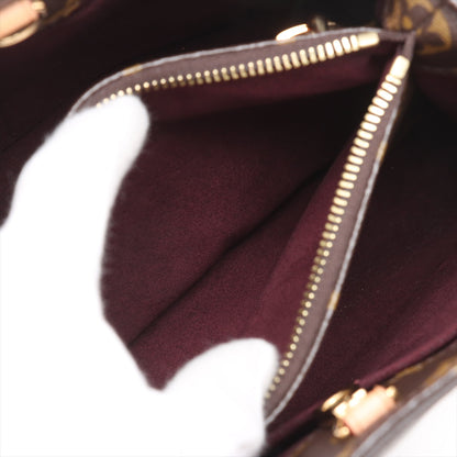 Bolsa Montaigne BB Monogram de lona com alça de mão 