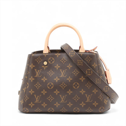 Bolsa Montaigne BB Monogram de lona com alça de mão 