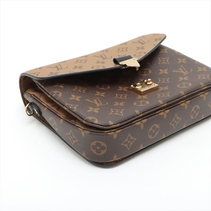 Pochette Metis Canvas Monogram Reverse Flap Umhängetasche Monogram Reverse 