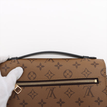 Pochette Metis Toile Monogram Rabat retourné Bandoulière Monogram Retourné 