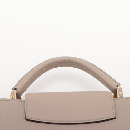 Capucines BB Taurillon Leather Handbag Beige