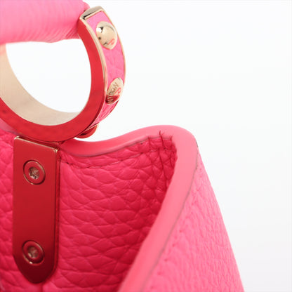 Capucines Mini Taurillon Leather Handbag Pink