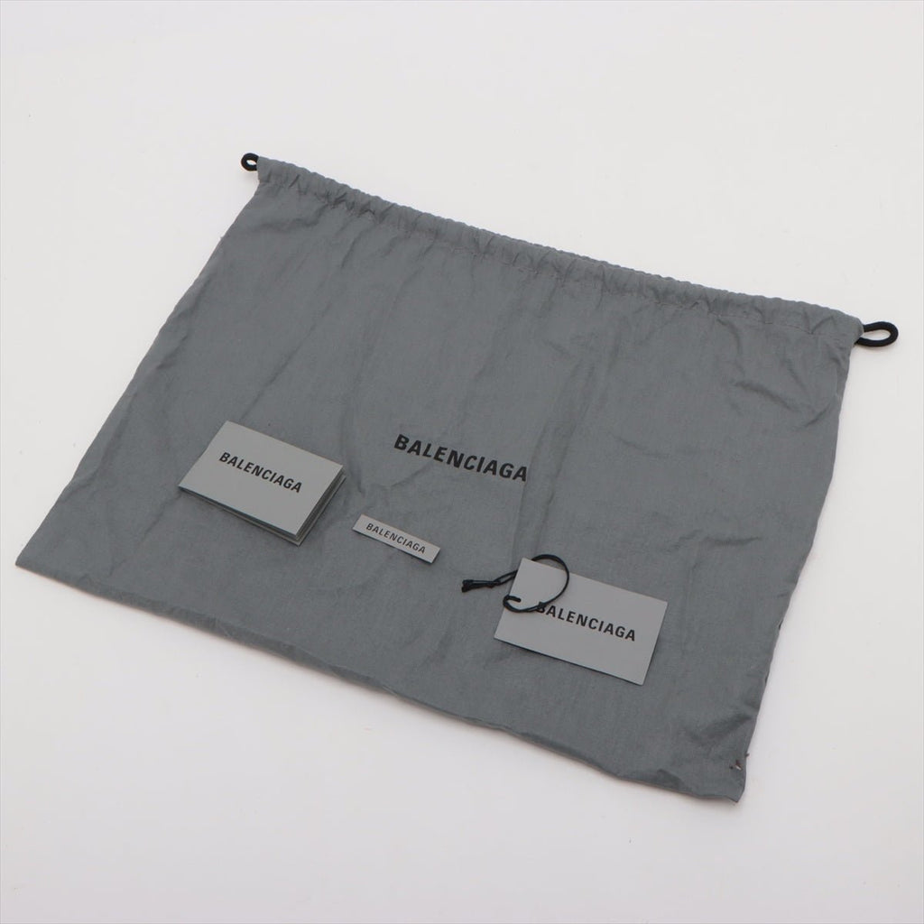 Second hand Balenciaga Le Cagole XS Arena Lambskin Leather 2 - Ways Hobo Bag Black & White - Tabita Bags