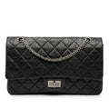 Second hand Chanel 2.55 Reissue Maxi Calfskin Leather Matelassè Flap Shoulder Bag Black - Tabita Bags