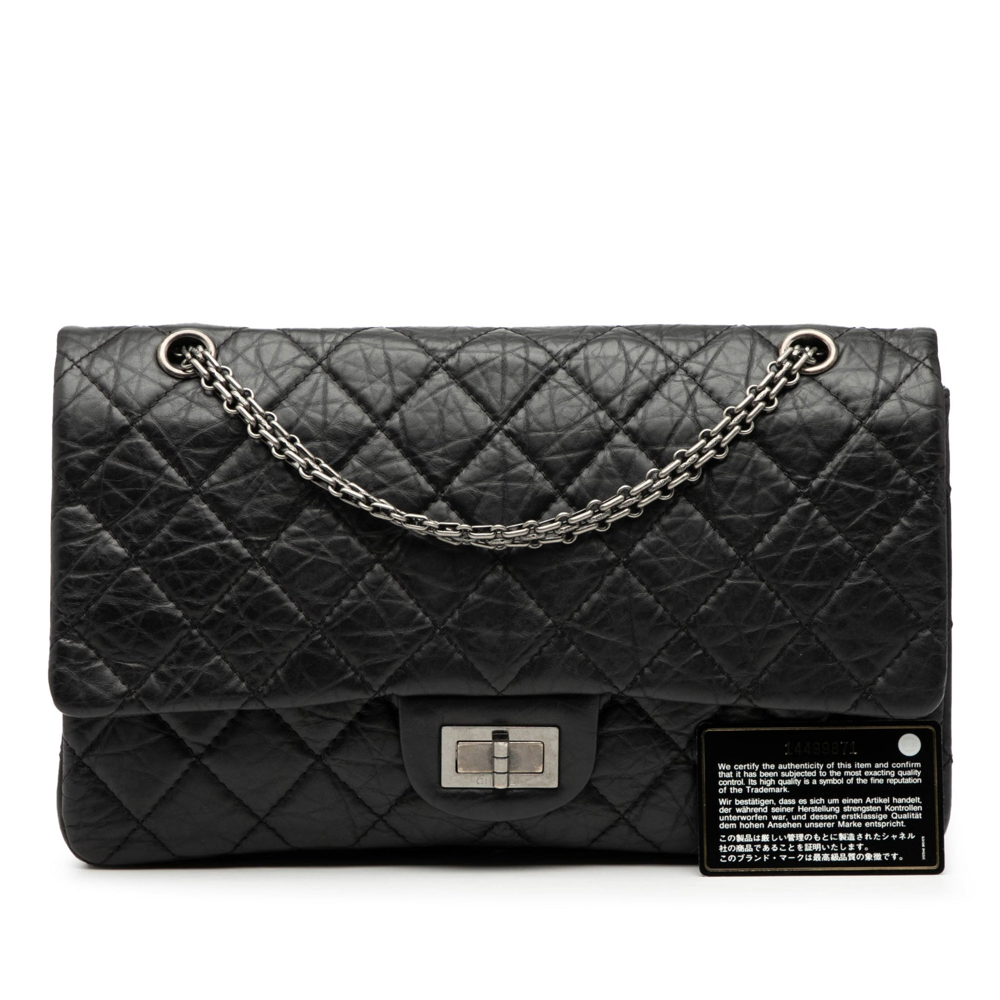 Second hand Chanel 2.55 Reissue Maxi Calfskin Leather Matelassè Flap Shoulder Bag Black - Tabita Bags