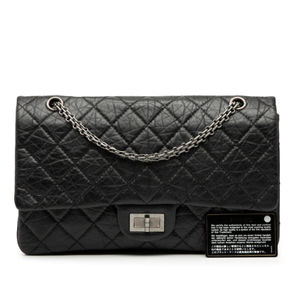 Second hand Chanel 2.55 Reissue Maxi Calfskin Leather Matelassè Flap Shoulder Bag Black - Tabita Bags