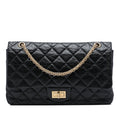 Second hand Chanel 2.55 Reissue Maxi Calfskin Leather Matelassè Flap Shoulder Bag Black - Tabita Bags