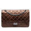 Second hand Chanel 2.55 Reissue Maxi Calfskin Leather Matelassè Flap Shoulder Bag Brown - Tabita Bags