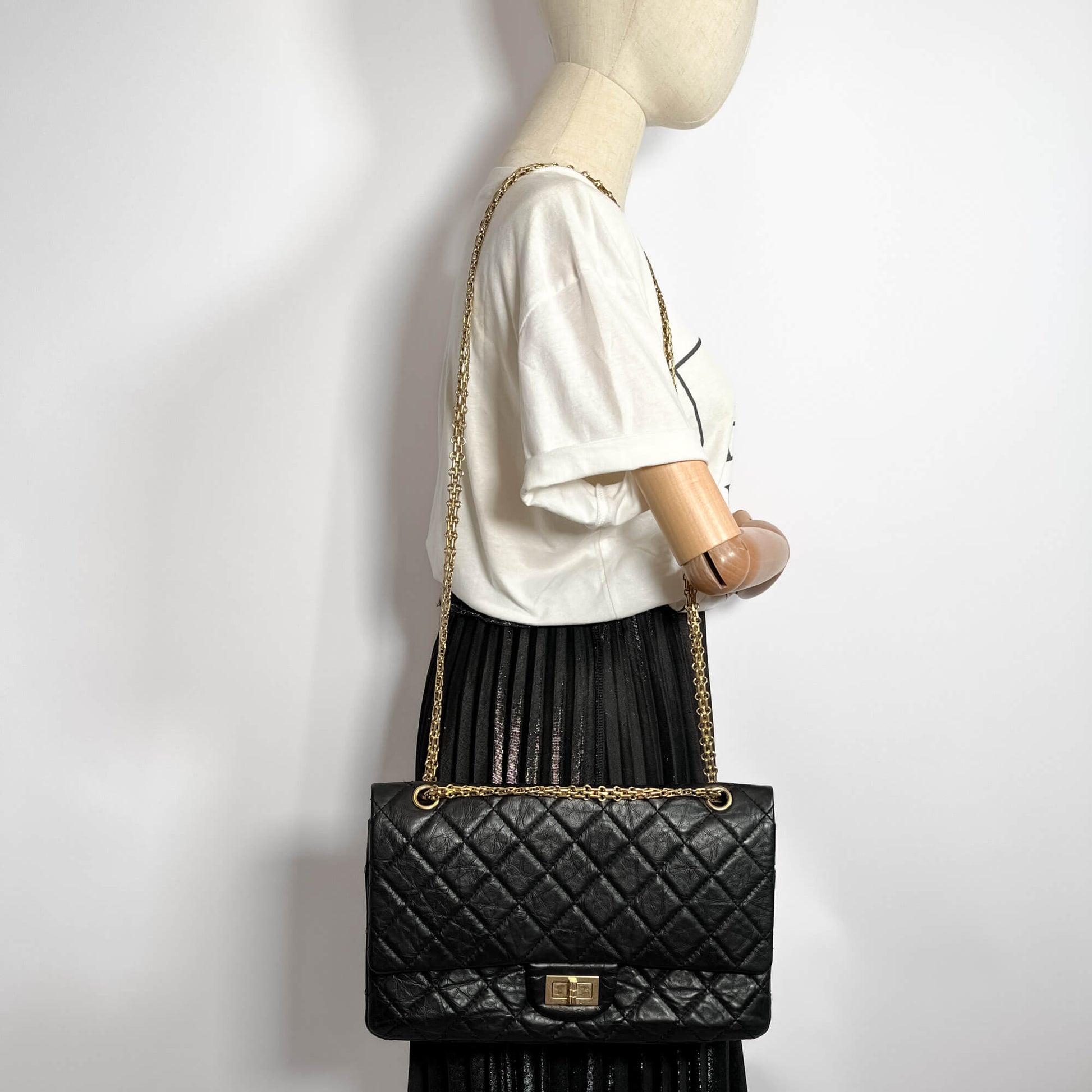 Second hand Chanel 2.55 Reissue Maxi Matelassè Lambskin Leather 2 - Ways Flap Bag Black - Tabita Bags