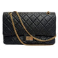 Second hand Chanel 2.55 Reissue Maxi Matelassè Lambskin Leather 2 - Ways Flap Bag Black - Tabita Bags