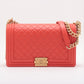 Second hand Chanel Boy Large Quilted Lambskin Leather 2 - Ways Flap Bag Coral Red - Tabita Bags