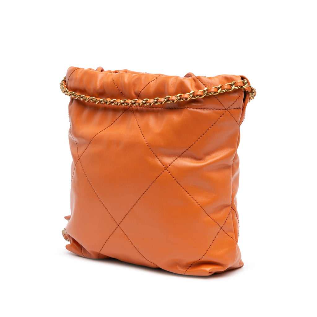 Second hand Chanel Chanel 22 Mini Leather Bucket Crossbody Orange - Tabita Bags