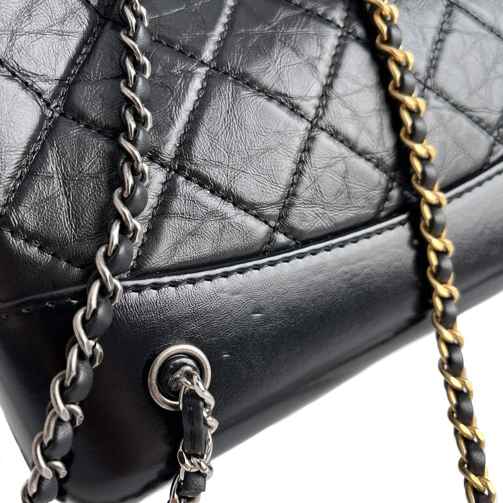 Second hand Chanel Gabrielle Matelassè Distressed Calfskin Leather 2 - Ways Bucket Backpack Black - Tabita Bags