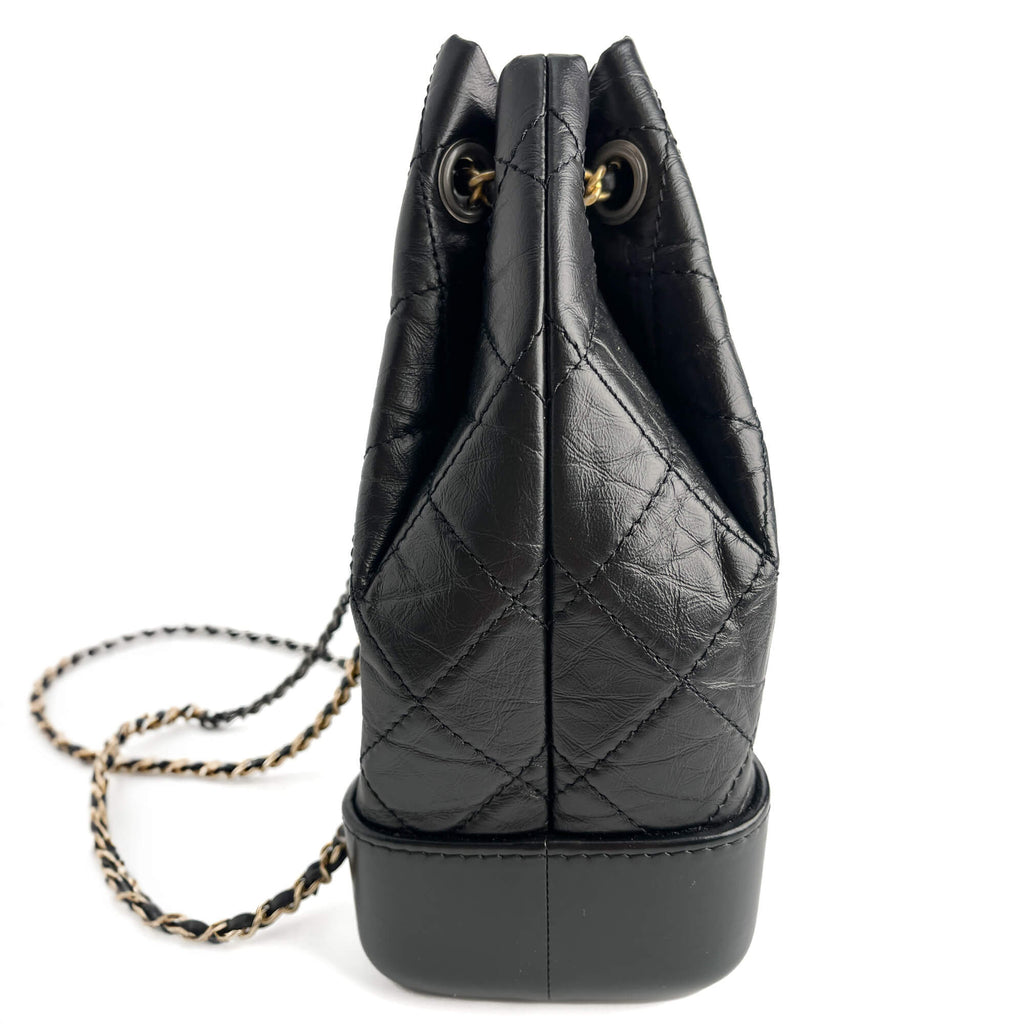 Second hand Chanel Gabrielle Matelassè Distressed Calfskin Leather 2 - Ways Bucket Backpack Black - Tabita Bags