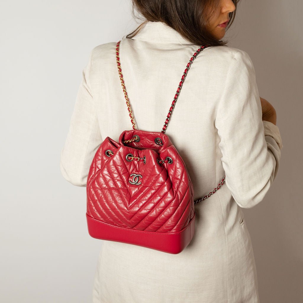 Second hand Chanel Gabrielle Matelassè Distressed Calfskin Leather 2 - Ways Bucket Backpack Cherry Red - Tabita Bags