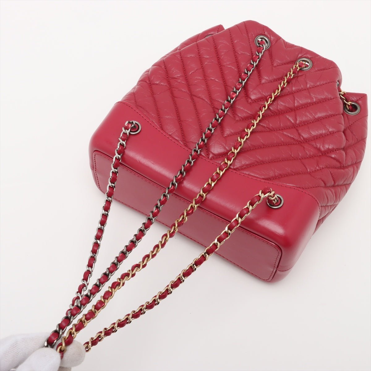 Second hand Chanel Gabrielle Matelassè Distressed Calfskin Leather 2 - Ways Bucket Backpack Cherry Red - Tabita Bags