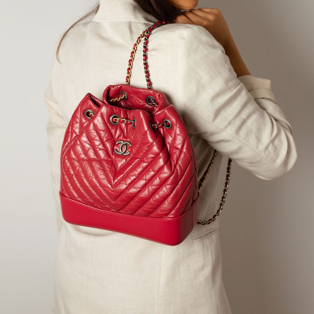 Second hand Chanel Gabrielle Matelassè Distressed Calfskin Leather 2 - Ways Bucket Backpack Cherry Red - Tabita Bags
