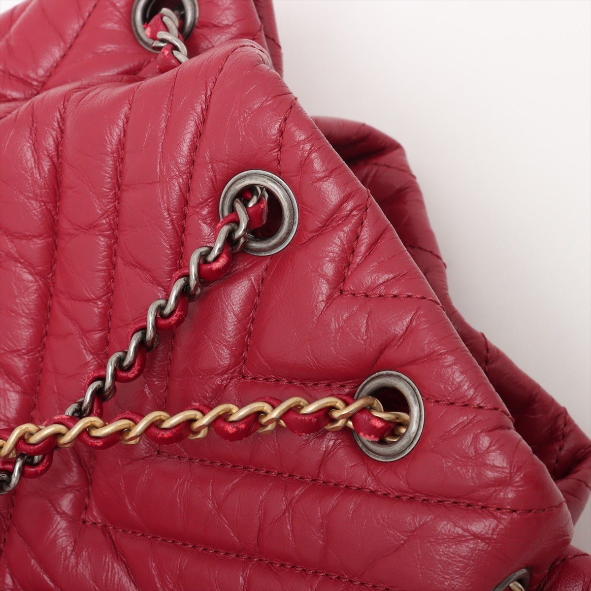 Second hand Chanel Gabrielle Matelassè Distressed Calfskin Leather 2 - Ways Bucket Backpack Cherry Red - Tabita Bags