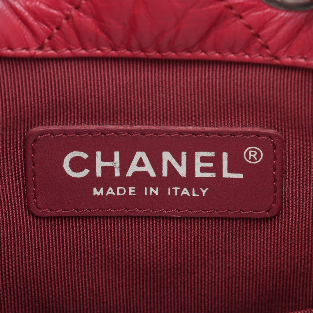 Second hand Chanel Gabrielle Matelassè Distressed Calfskin Leather 2 - Ways Bucket Backpack Cherry Red - Tabita Bags
