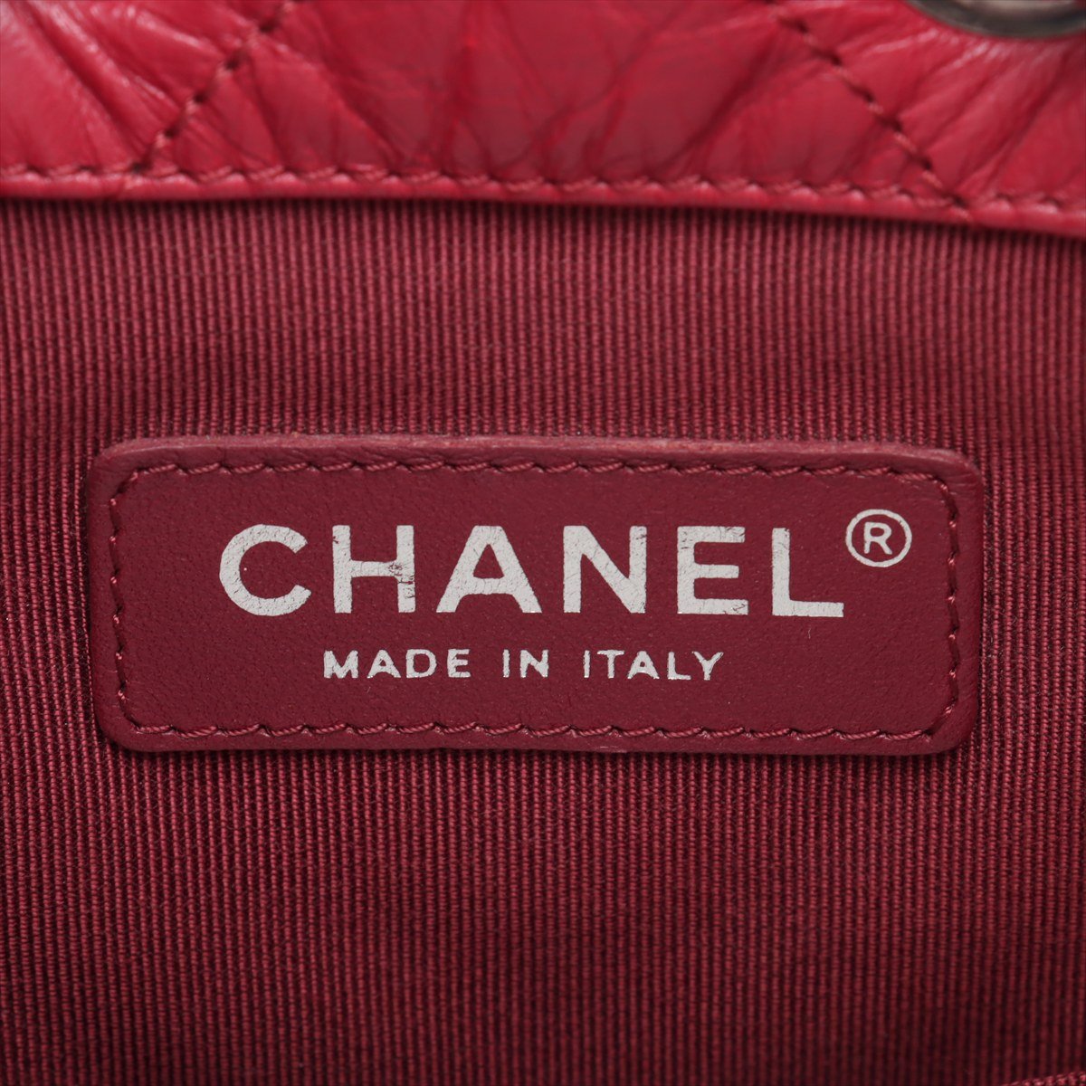 Second hand Chanel Gabrielle Matelassè Distressed Calfskin Leather 2 - Ways Bucket Backpack Cherry Red - Tabita Bags
