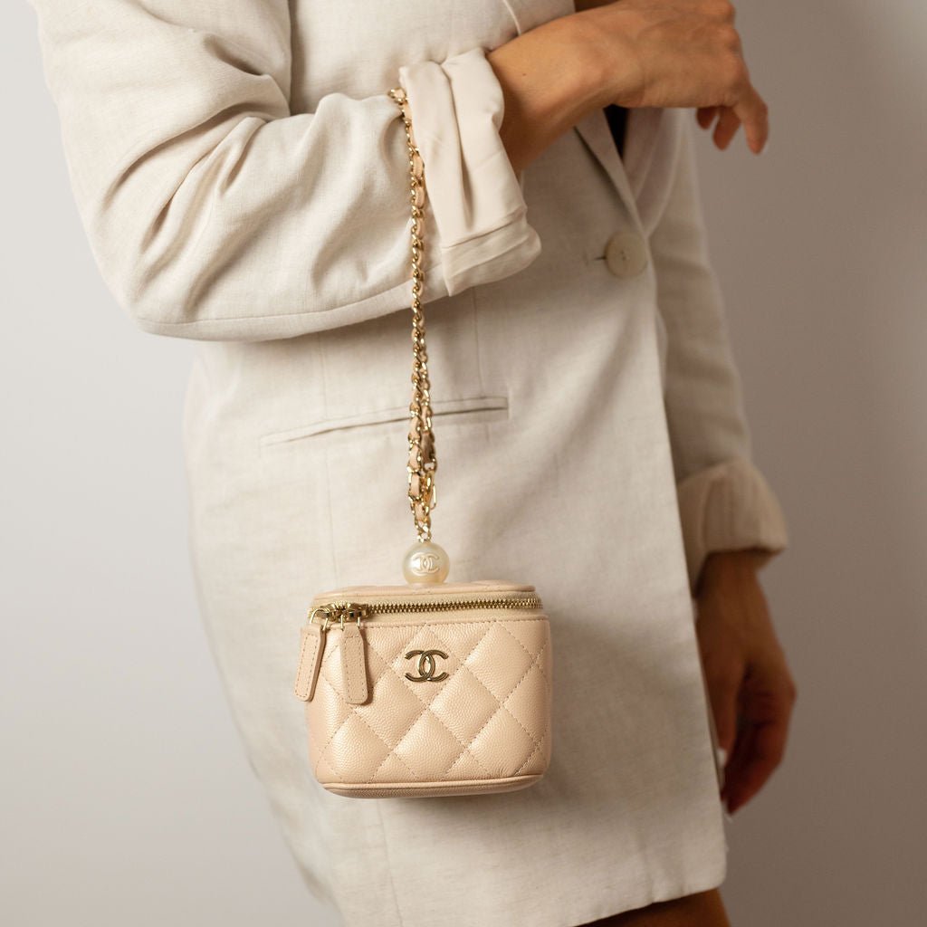 Second hand Chanel Vanity Case Mini Caviar Leather Pearl Charm Quilted Handbag Champagne Gold - tone - Tabita Bags