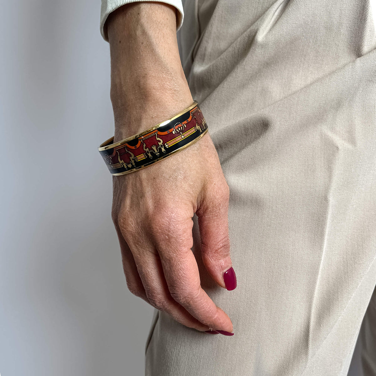 Second hand Hermes Emanel Gold Plated Metal Bracelet Red Horse Carriage Multicolor - Tabita Bags