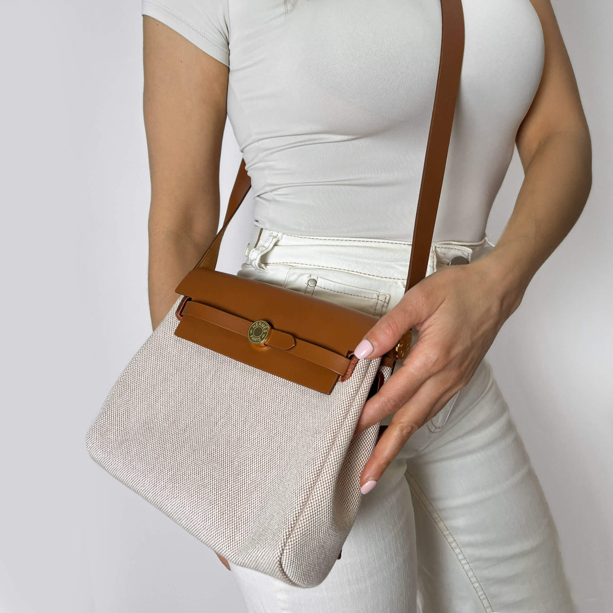 Second hand Hermes Herbag Mini Vache Hunter Leather Crossbody Fauve - Tabita Bags