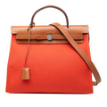 Second hand Hermes Herbag PM Canvas 1 pouch Top - handle Handbag Orange - Tabita Bags