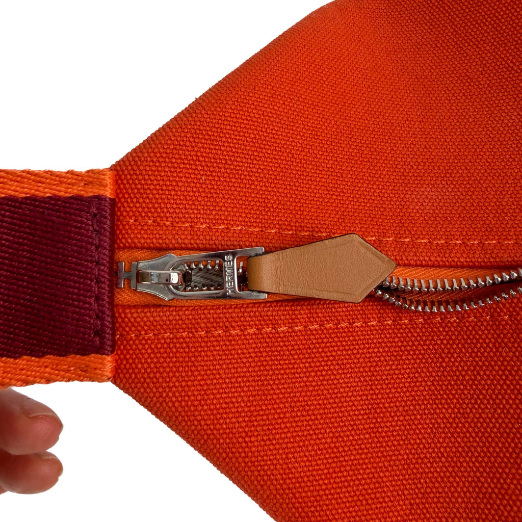 Second hand Hermes Trousse de Toilette Bride GM Wool Beauty Case Orange - Tabita Bags