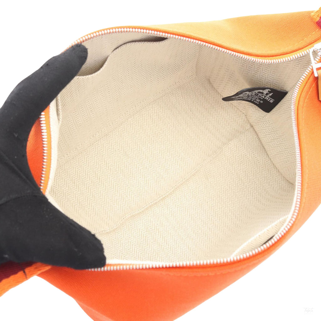 Second hand Hermes Trousse de Toilette Bride PM Wool Beauty Case Orange - Tabita Bags