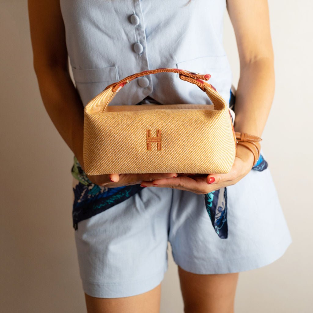 Second hand Hermes Trousse de Toilette Bride PM Wool Beauty Case Orange - Tabita Bags