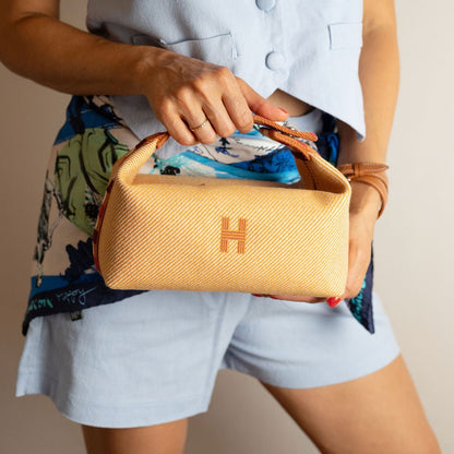Second hand Hermes Trousse de Toilette Bride PM Wool Beauty Case Orange - Tabita Bags