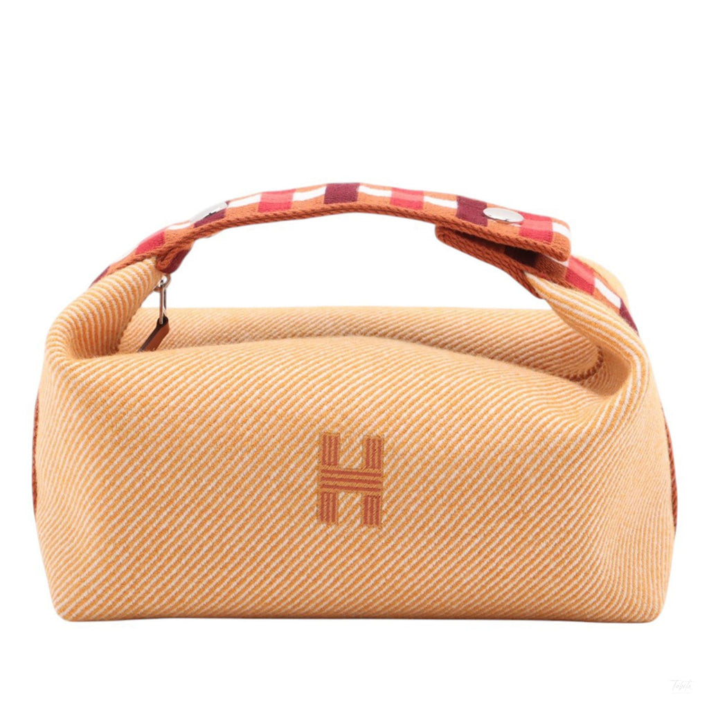 Second hand Hermes Trousse de Toilette Bride PM Wool Beauty Case Orange - Tabita Bags