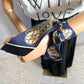 Second hand Hermes Twilly Silk Lift Profile RM/Marine/Noir/Gold Blue - Tabita Bags