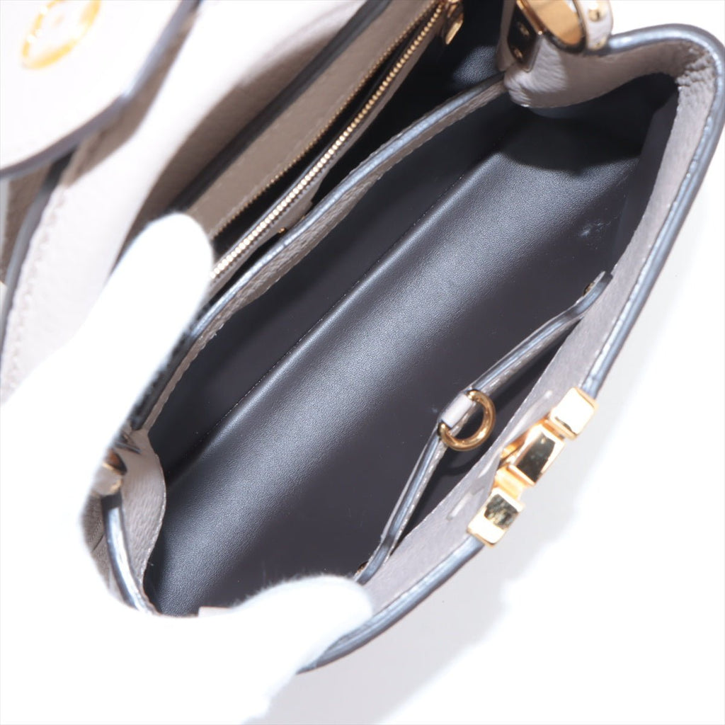 Second hand Louis Vuitton Capucines BB Taurillon Leather Handbag Beige - Tabita Bags