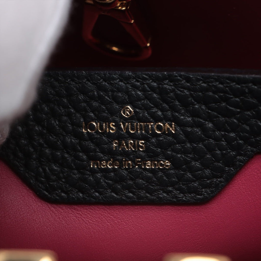 Second hand Louis Vuitton Capucines PM Taurillon Leather 2 - Ways Handbag Black - Tabita Bags