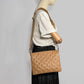 Second hand Louis Vuitton Coussin PM Empreinte Leather 3 - Ways Messenger Bag Camel - Tabita Bags