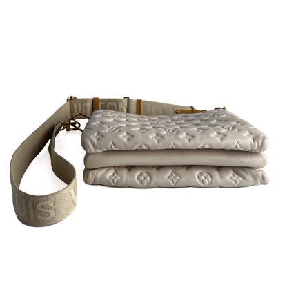 Second hand Louis Vuitton Coussin PM Leather Empreinte Messenger Crossbody Off - White - Tabita Bags