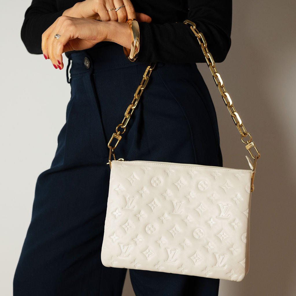 Second hand Louis Vuitton Coussin PM Leather Empreinte Messenger Crossbody Off - White - Tabita Bags