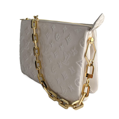 Second hand Louis Vuitton Coussin PM Leather Empreinte Messenger Crossbody Off - White - Tabita Bags